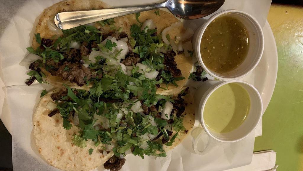Mexico’S Tacos · Four steak, chicken, or carnitas tacos served in a small double corn tortilla with onions, and cilantro accompanied with the taco sauce.
