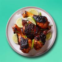 Jamaican Jerk Chicken · Chicken seasoned and marinated with Jamaica's finest spices then grilled to perfection. Serv...