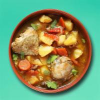Chicken Stew · Chunks of chicken well-marbled bee seared in oil and then gently braised with garlic and oni...