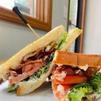 Commons Blt · Bacon, lettuce and tomato with mayo on toasted sourdough bread.