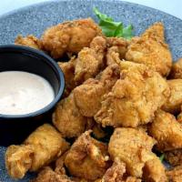 Boneless Crispy Chicken · Served with Our Special Calypso Sauce.