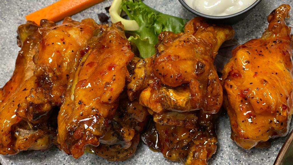 Salsa Con Fuego Chicken Wings · Choose from Caribbean Guava, Buffalo, or Sweet Chili.