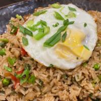 Fried Rice · Latin Fried Rice with Shrimp, Chicken, and Pork, Sweet Plantain topped with Fried Egg.

Dish...
