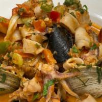 Seafood Mofongo · Mashed Plantains in a Creole Sauce served with Clams, Mussels, Shrimp, and Calamari.