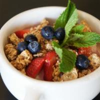 Fresh Berry Parfait · Vanilla Greek yogurt, granola (contains nuts) and fresh berries.