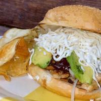 Cemita Poblanita · Milanesa de Pollo, lomo de puerco, salchicha,queso de puerco.
Quesillo, cebollas, Chipotle &...