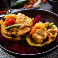 Lunch-Thai Mango Chicken · Wok sauteed with fresh mango in a homemade mild spicy sweet mango glaze