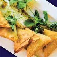 Cocktail Samosas ( 5 Piece) · Cheese & jalapeño or chicken fried pastry with spiced savory fillings.
