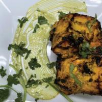 Salmon Tikka · Chunk to Fish Dry-Rubbed with Tantalizing Spices & Cooked in Tandoor.