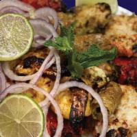 Malai Kebab · Mouthwatering Grilled Chicken Cubes Marinated with Vegetables, Spices & Fresh Cream.