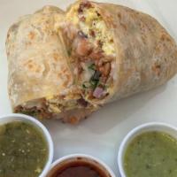 Bacon & Egg Burrito · Flour tortilla with a savory filling. Pinto beans, Spanish or Mexican rice, and Monterey Jac...