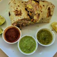 Ham & Egg Burrito · Flour tortilla with a savory filling. Pinto beans, Spanish or Mexican rice, and Monterey Jac...