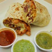 Pastrami & Egg Burrito · Flour tortilla with a savory filling. Pinto beans, Spanish or Mexican rice, and Monterey Jac...