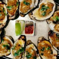 Grilled Oysters · Fresh Oysters grilled to perfection in our signature Garlic Butter sauce!