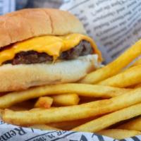 Kid'S Burger · Delicious juicy beef patty, american cheese, french fries.
