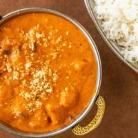 Navratan Korma · Vegetables braised with cream, and spices to produce a thick sauce. Served with a side of ri...