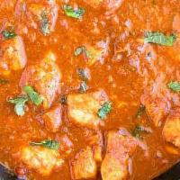 Chicken Vindaloo · Chicken, and potato cooked into a spicy, and sour curry to create this delish. Served with a...