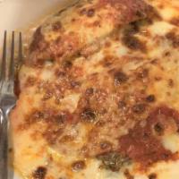 Meat Lasagna · Layers of our homemade lasagna filled with ground beef, Italian sausage, ricotta cheese, and...