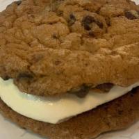 Ice Cream Cookie · Homemade chocolate chip cookies with vanilla ice cream.  Yummy!