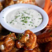 Chicken Wings (20 Wings) · Smoked Kansas City BBQ | Buffalo Thai Chili
Served with carrots, ranch, or blue cheese Choic...