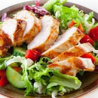 Grilled Southwestern Chicken Salad · (Cross valley farms organic spring mix, topped with grilled chicken breast, tomatoes, cucumb...