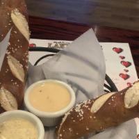 Bavarian Pretzel Sticks · Served with a sidecar of our signature spicy queso and spicy mustard.