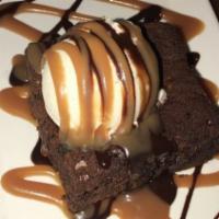 Brownie Vanilla Ice Cream · chunks of homemade brownie pieces blended with our vanilla bean ice cream.