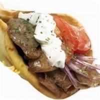 Lamb Gyro · Served with lettuce, tomatoes, your choice white sauce or hot sauce.