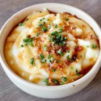 Potato Puree · Drippings, chives, and crispies.