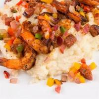 Shrimp & Grits · Shrimp, grits, sautéed peppers and onion, sausage bits over a creamy bed of grits.