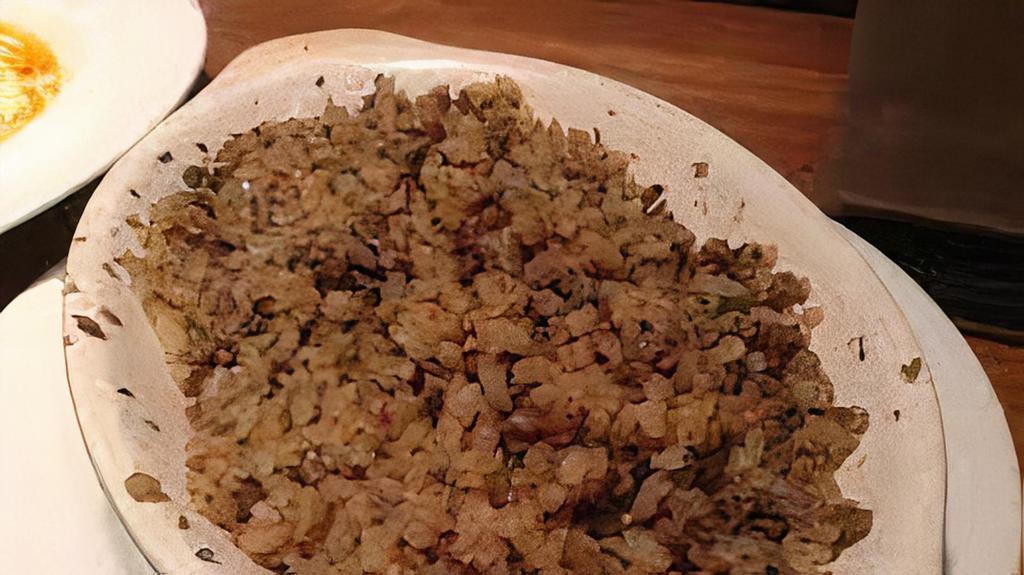 Dirty Rice · Cajun seasoning, ground beef, ground sausage, white rice, broth, bell pepper, celery, onion, garlic, olive oil.