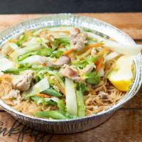 Pancit Bihon · Rice stick noodles simmered in a chicken broth soy sauce mix. Topped with sautéed veggies & ...