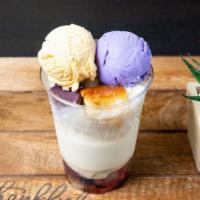Halo-Halo · Layers of mixed fruits & beans, topped with shaved ice, evaporated milk, leche flan, and ube...