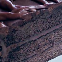 Triple Chocolate Cake · Our Signature 5 Layer Ultimate chocolate lovers cake, Get the milk ready!