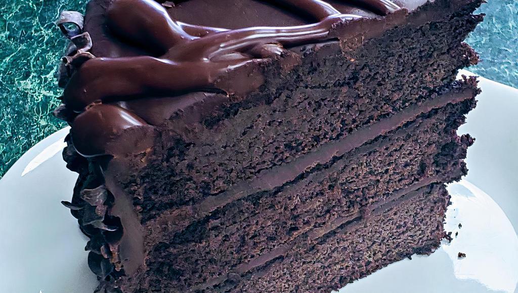 Triple Chocolate Cake · Our Signature 5 Layer Ultimate chocolate lovers cake, Get the milk ready!