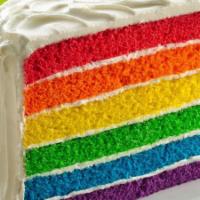 Rainbow Cake · A large moist slice  just to brighten your day. A tall 4 layer cake with the vibrant colors ...