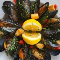 Mussels · Live Maine mussels, white wine, garlic, sweety drops peppers, parsley