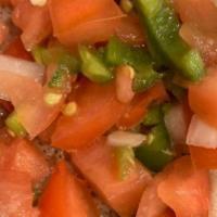 Timatim Fitfit · Vegetarian. Chopped fresh tomato, onion, hot pepper salad and house dressing mixed with shir...