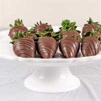 1 Dozen Milk Chocolate Covered Strawberries  · Fresh & juicy strawberries are dipped and drizzled to perfection, with Ghirardelli Milk Choc...