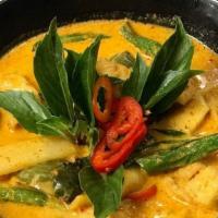 Red Curry · Medium spicy. Choice of meat in Thai red curry paste, bamboo shoot, eggplants, bell pepper i...