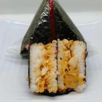 Onigiri - Spicy Salmon · Sushi Rice with spicy salmon and serrano pepper filling, wrapped in roasted seaweed sheet.
