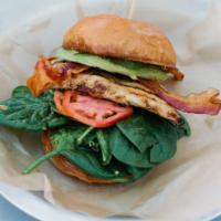Grilled Chicken Club · Grilled chicken, avocado, tomato, bacon, spinach, with roasted garlic mayo, and spicy mustard.