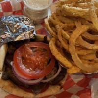 Gyro Sandwich · Gyro meat, tomato, red onion, served in Pita Bread and tzatzki sauce on the side