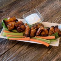 Chicken Wings · Served with carrot and celery sticks and your choice of dipping sauce.