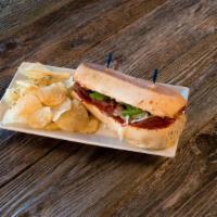 Totally Italian Sub · Pepperoni, salami, canadian-style bacon, green peppers, olives, and onions with our homemade...