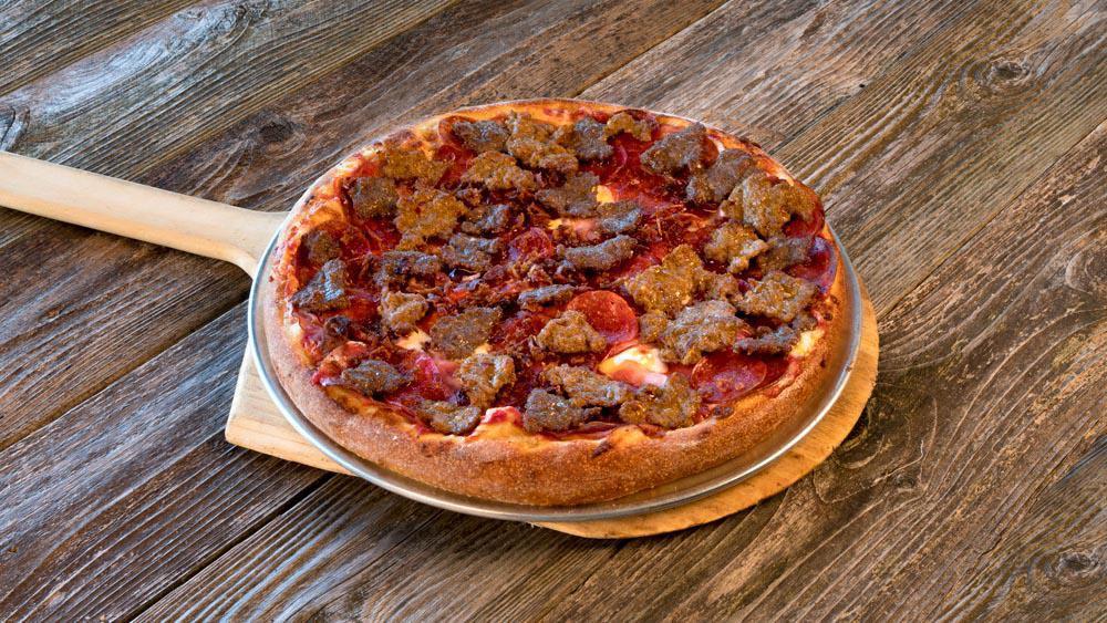 The Pounder · Pepperoni, canadian-style bacon, salami, hickory bacon, Italian sausage, and beef.
