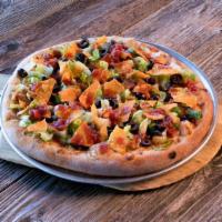 Taco Pizza · Choice of grilled chicken or ground beef with refried beans and taco seasoning. Topped with ...