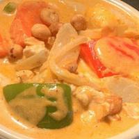 #.4 Massaman Curry · Smoked red curry and coconut milk simmered with potatoes, carrots, onions, peanuts, and bell...