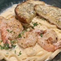 Grilled Shrimp Alfredo · Fettuccine pasta, parsley & garlic bread