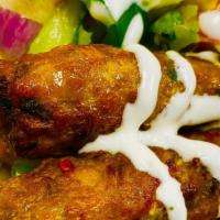Chicken Kabob  · Come with two Kabab with salad and White sauce